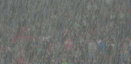 Fans im Regen